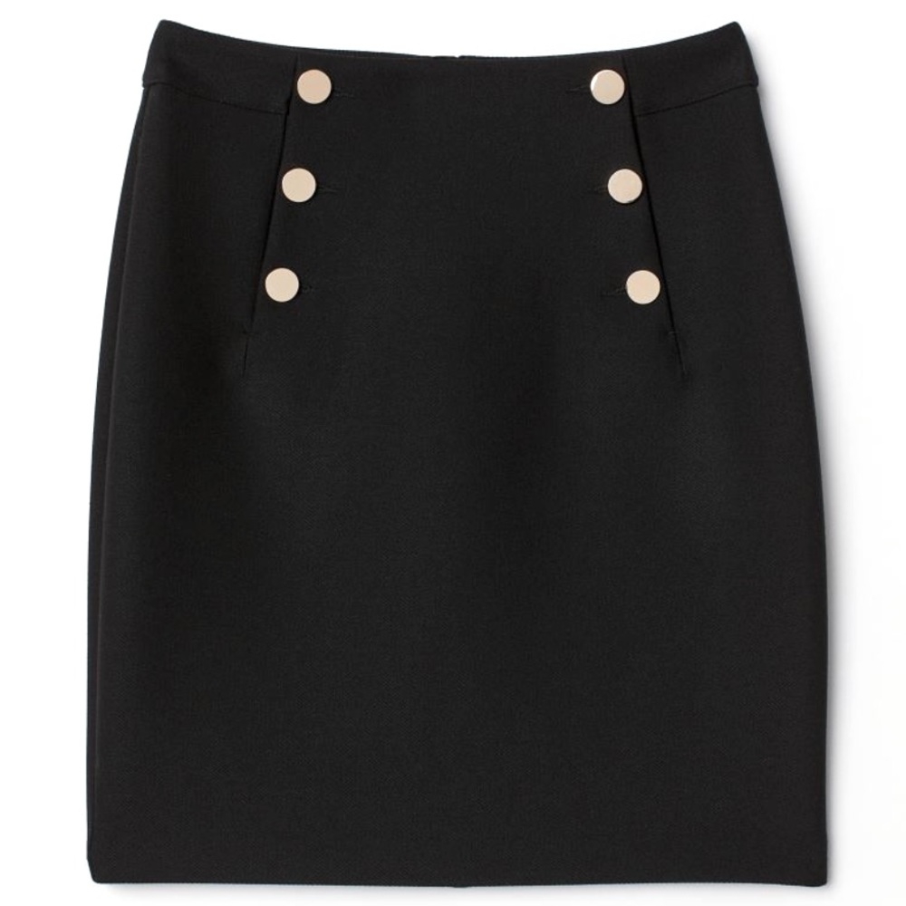 Knee-length skirt with decorative buttons at front. Concealed zip at back